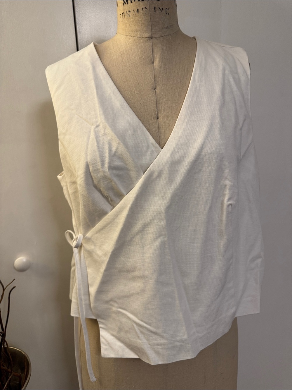 White Wrap Front Sleeveless Blouse